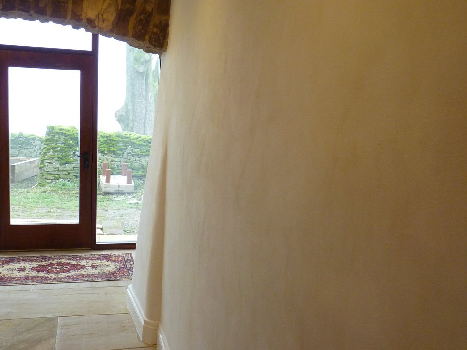 Lime plaster insulation applied to interior walls